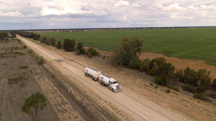 IOR bulk fuel truck driving along road in remote or rural Australia