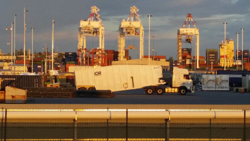 IOR Petroleum frac tank on truck at the Fremantle Harbour filled with many shipping containers near Perth